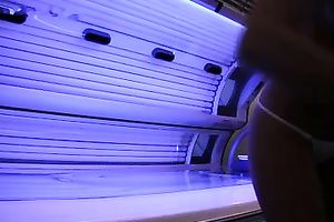 Perfect breasty dark brown hottie in the solarium naked on hidden camera