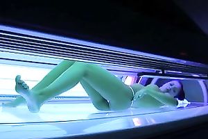 Perfect breasty dark brown hottie in the solarium naked on hidden camera