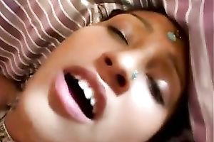 Sweet cutie tastes perspired balls and soaked weenies on the bed