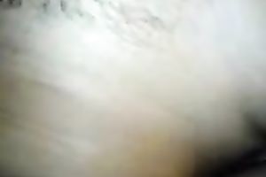 Sultry dark haired GF copulates her moist curly wet crack with dildo