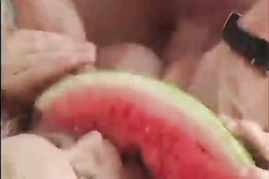 Blonde floozy with large love muffins blows hard pecker with watermelon