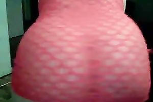 Curvaceous and bosomy dilettante shows off her booty in fishnet suit