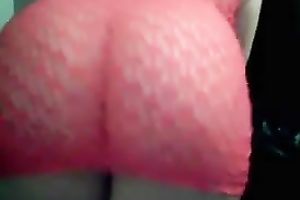 Curvaceous and bosomy dilettante shows off her booty in fishnet suit