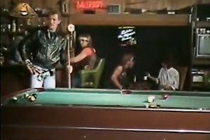 Dirty floozy wags her butt standing on a bar counter