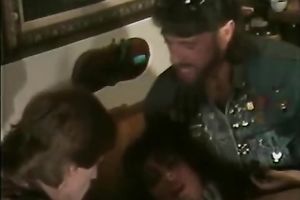 Dirty floozy wags her butt standing on a bar counter