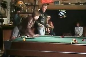 Dirty floozy wags her butt standing on a bar counter