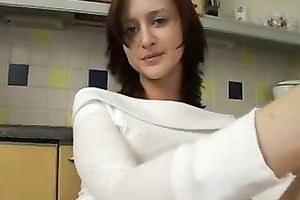 Lusty slender black cock sluts in white costume masturbates in the kitchen