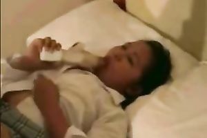 Chubby Asian floozy sucks a sex-toy previous to shoving it in her cum-hole