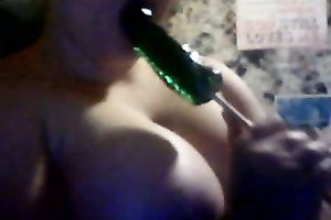 Busty white white wife on cam blows a sweetmeat in the shape of a weenie