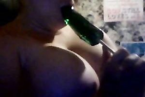 Busty white white wife on cam blows a sweetmeat in the shape of a weenie