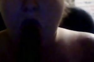 Busty white white wife on cam blows a sweetmeat in the shape of a weenie