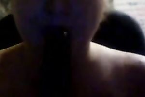 Busty white white wife on cam blows a sweetmeat in the shape of a weenie