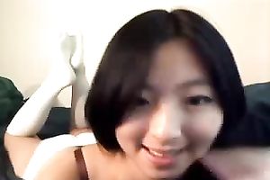 Exotic web camera model with sparkling eyes is engulfing her sex tool like eager