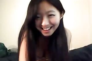 Exotic web camera model with sparkling eyes is engulfing her sex tool like eager