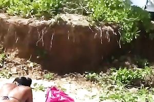 A white bitch with mesmerizing arse acquires caught on my hidden livecam on a beach