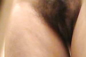 Watch me stripping and showing my shaggy twat for camera