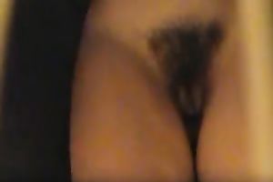 Watch me stripping and showing my shaggy twat for camera