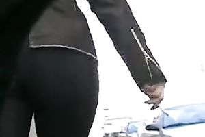 This large butted female-dominator looks glamorous in her taut panties