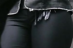 This large butted female-dominator looks glamorous in her taut panties