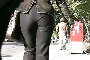 This large butted female-dominator looks glamorous in her taut panties