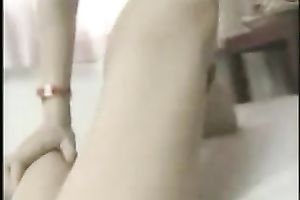 Asian wench rubs and fingers her unshaved and all juicy cunt