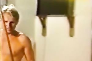 Busty blond gives oral stimulation to one well endowed guy