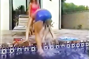 Busty blond gives oral stimulation to one well endowed guy