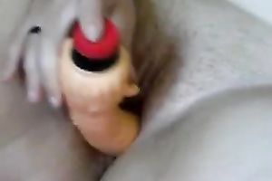 Thick older dark brown cheating wife fondling herself with a sex toy