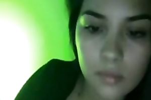 Desirable Latin beauty exposes her pretty large whoppers on web camera