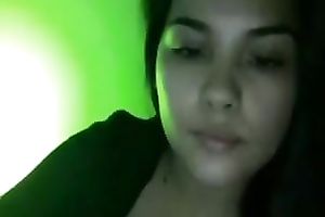 Desirable Latin beauty exposes her pretty large whoppers on web camera