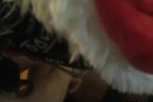 Amateur dark brown blows and receives drilled near a Christmas tree