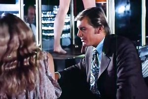 Sizzling breasty cutie disrobes for judges on the podium