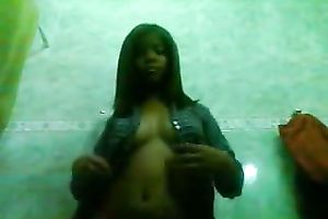 Amazing swarthy playgirl shows off her assets on a camera