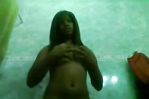 Amazing swarthy playgirl shows off her assets on a camera