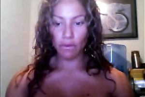 Sporty livecam model with hirsute hair shows off her large fake boobs