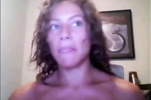 Sporty livecam model with hirsute hair shows off her large fake boobs
