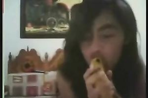 Exotic web camera bitch sucks a banana in advance of pushing it in her bushy vag
