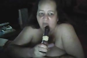 Ugly older fattie sucks a fake penis in livecam solo scene