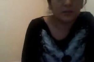 Cute exotic dark brown lastly flashes her slit on web camera