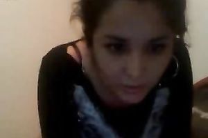 Cute exotic dark brown lastly flashes her slit on web camera