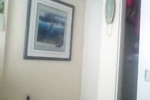 Nerdy redhead housewife shows her large breasts and bald cunt for the cam