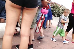 Big-assed playgirl wearing shorts gets caught on my hidden web camera outdoors