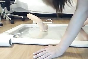 Brunette skank toys her muff whilst sitting on a mirror