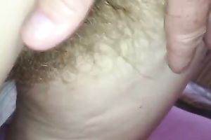 My husband demonstrates her hirsute trench and lets me finger it