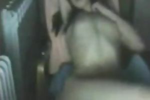 Slim brunette hair rubs her zeppelins and love tunnel in front of a livecam