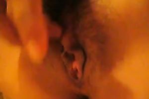 My concupiscent horny white wife entertains herself by fingering her unshaved love tunnel