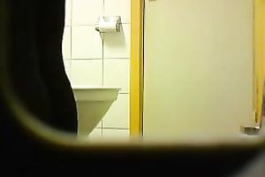 Lovely pale skin white bitch in the restroom on hidden web camera