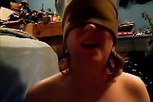 Blindfolded nympho sucks her gllassd marital-device like a dick