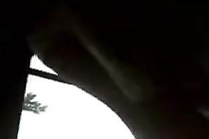 Chubby dark brown bitch gives deepthroat oral-sex on a back seat of the car