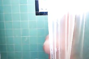 Brunette big beautiful woman washes her heavy bazookas in the shower